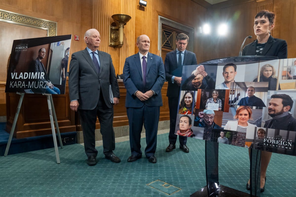 Senator Ben Cardin, far left, chair of the Senate Foreign Relations Committee, stands with Evgenia Kara-Murza in Washington on Tuesday (AP)