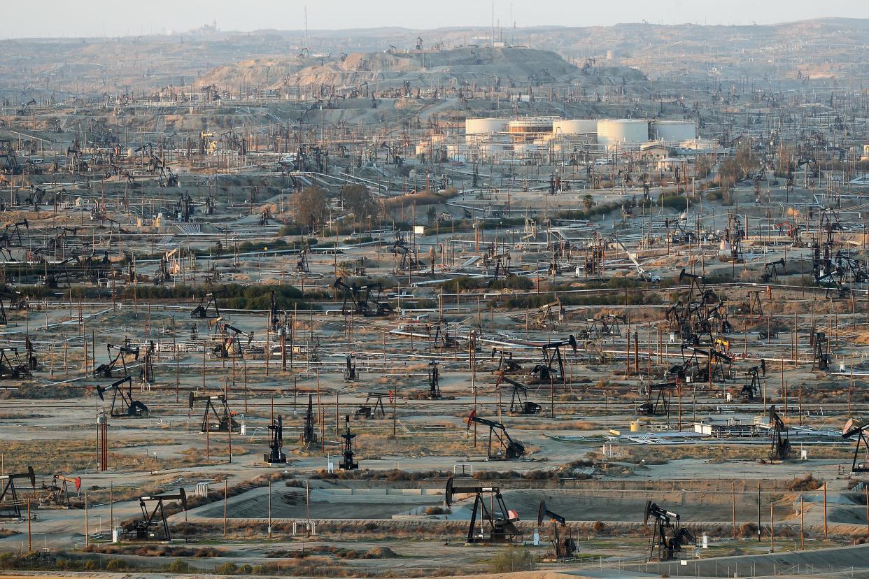 Oilfield infrastructure dominates the landscape at the densely developed Kern River oil field just outside of Bakersfield, California, Feb. 20, 2020.