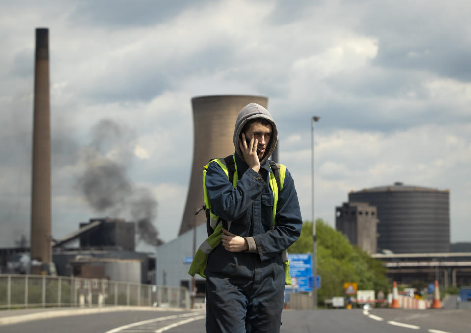 Workers leave the steelworks plant in Scunthorpe following a shift change as owner British Steel is to go into official recievership after failing to secure funds for its future.