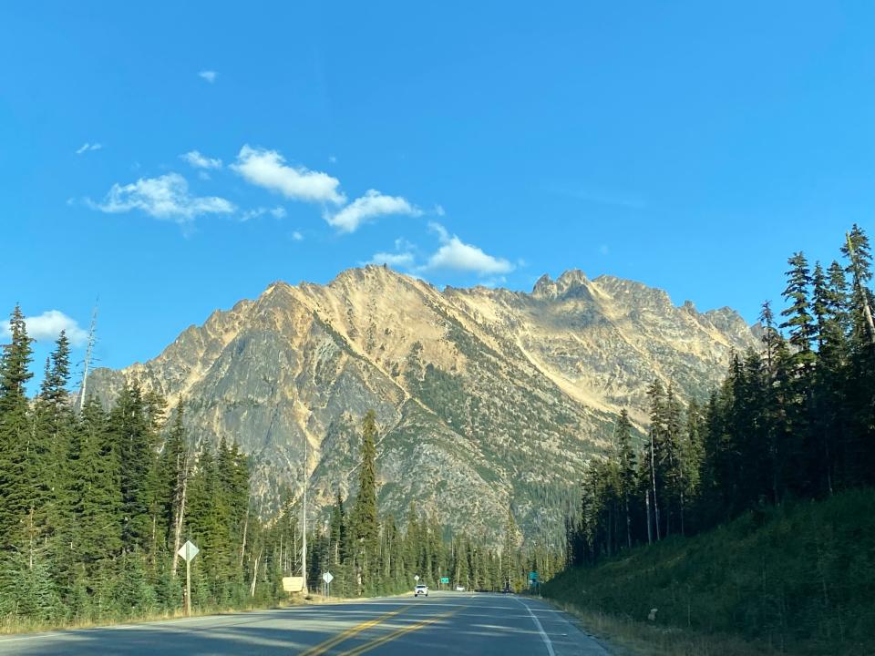 Dramatic granite peaks tower over the North Cascades Scenic Highway, a drive on State Route 20 that goes through the heart of North Cascades National Park. It is part of the Cascade Loop, a multi-day motor trail touted as Washington’s Ultimate Road Trip.