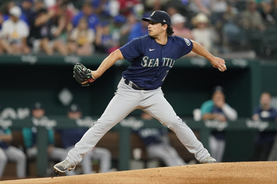 Seattle Mariners starting pitcher Marco Gonzales throws during the first inning of a baseball game against the Texas Rangers in Arlington, Texas, Saturday, June 4, 2022. (AP Photo/LM Otero)