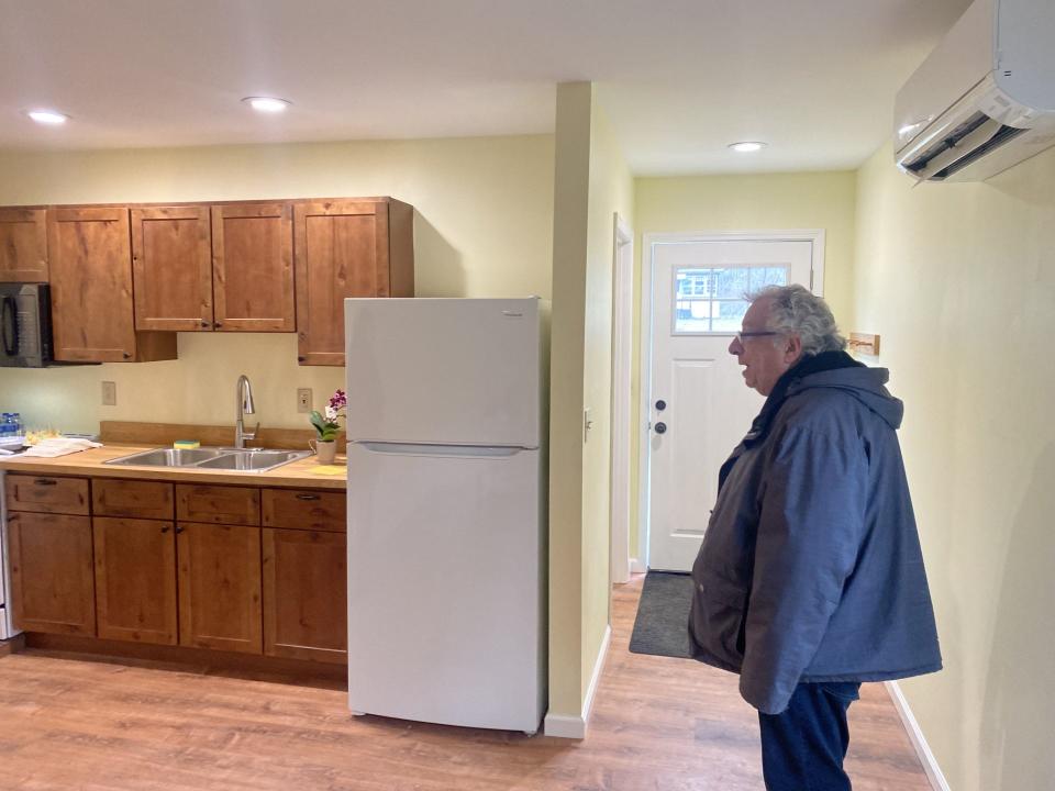 Bill Dugan takes a look at his new duplex home on Hornby Road, in the Town of Corning,