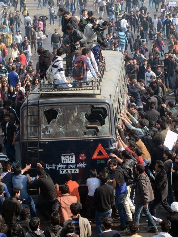 Demonstrators attack a police vehicle during a protest calling for better safety for women following the rape of a student, in New Delhi on December 22, 2012. The fatal attack in December 2012 sparked street protests over India's failure to protect women from violence and led to parliament passing a tougher law against sex crime