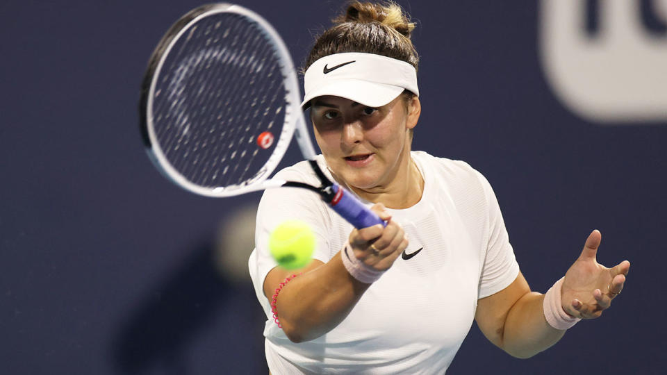 Seen here, Bianca Andreescu hits a forehand return against Garbine Muguruza. 