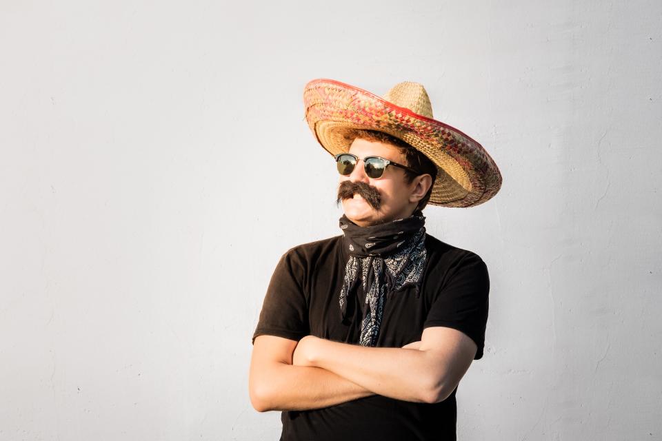 man dressed in sombrero as a halloween costume