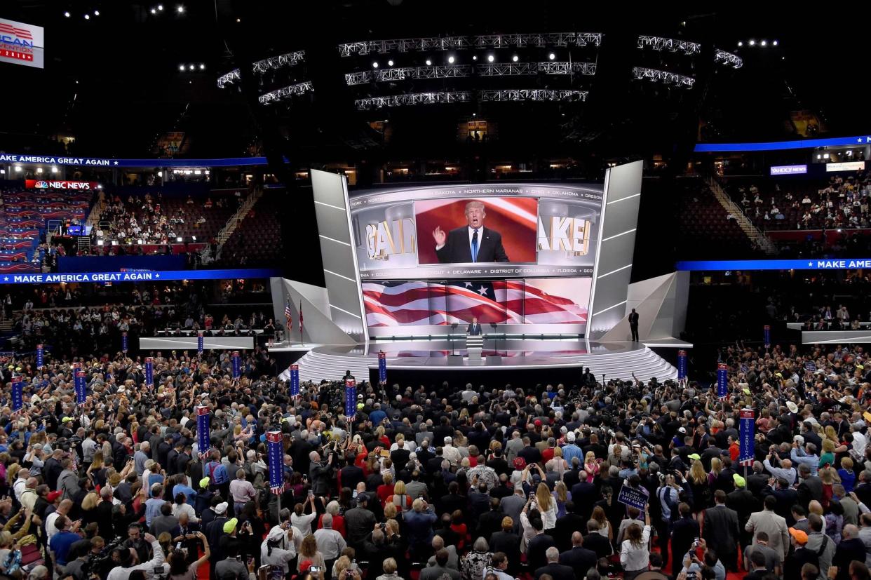 Presumptive Republican presidential candidate Donald Trump introduces his wife Melania Trump to delegates on the first day of the Republican National Convention on July 18, 2016 at Quicken Loans Arena in Cleveland, Ohio. 