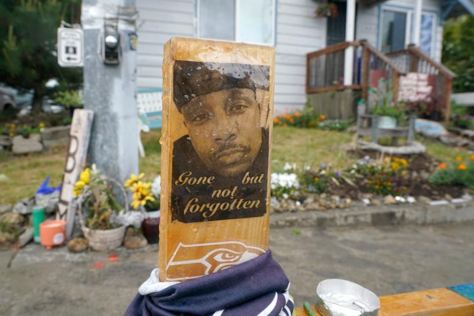 A sign is displayed at a memorial in Tacoma, Washington, where Manuel “Manny” Ellis died (Copyright 2021 The Associated Press. All rights reserved.)