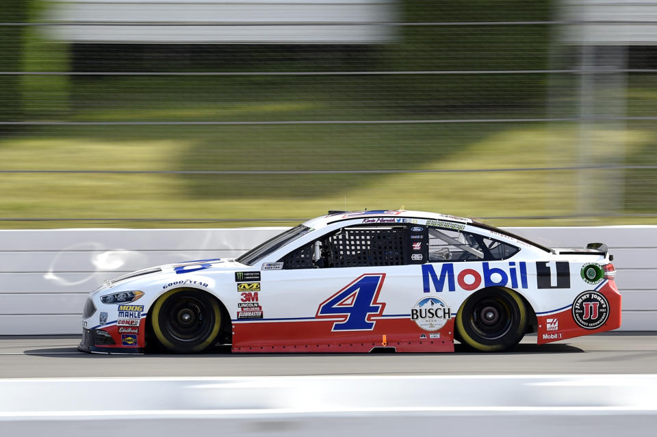 Kevin Harvick drives down the front stretch during qualifying for Sunday's NASCAR Cup Series auto race, Saturday, July 28, 2018, in Long Pond, Pa. Harvick qualified on the pole, but his car failed post-qualifying inspection, and he will start at the rear of the field. (AP Photo/Derik Hamilton)