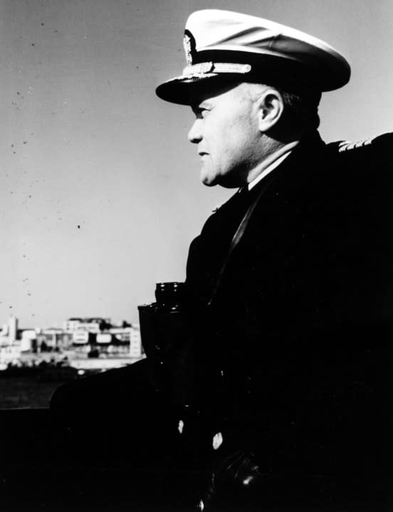 Commanding Officer of USS TRITON (SSN-586) on the bridge of the submarine, 10 May 1960. (National Archive)