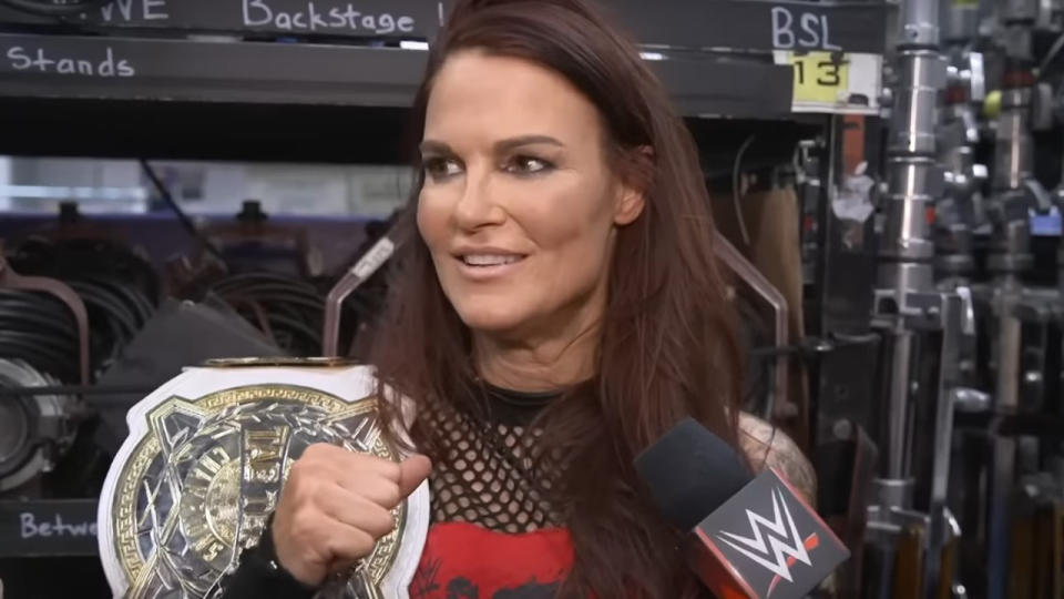 Lita after winning the WWE Women's Tag Team Championship