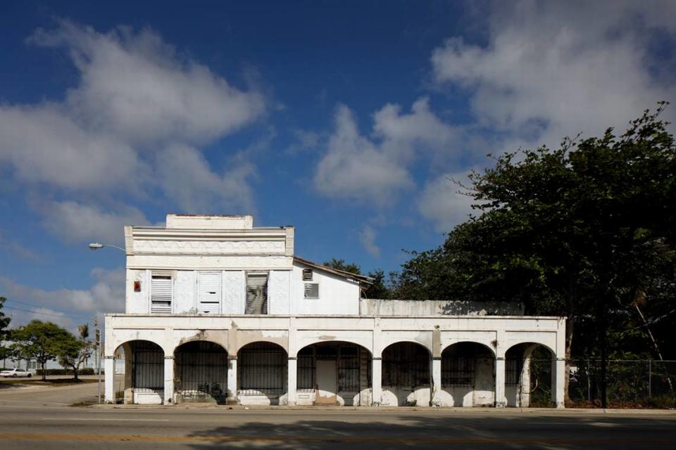 The long-vacant DuPuis medical office and pharmacy building and its sidewalk arcade in Miami’s Little Haiti neighborhood as photographed in 2022.