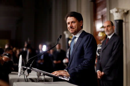 FILE PHOTO: Newly appointed Italy Prime Minister Giuseppe Conte speaks to the media after a consultation with President Sergio Mattarella at the Quirinal Palace in Rome, Italy, May 23, 2018. REUTERS/Alessandro Bianchi/File Photo