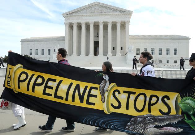 Climate activist groups protest the Atlantic Coast Pipeline in front of the Supreme Court in February 2020. Duke Energy Corp. and Dominion Energy Inc., the companies behind the controversial project, canceled it later that year “due to ongoing delays and increasing cost uncertainty.”  (Photo: Mark Wilson/Getty Images)