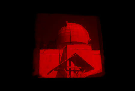 A solar tunnel telescope dome is seen through a darkroom at the Kodaikanal Solar Observatory, India, February 4, 2017. REUTERS/Danish Siddiqui