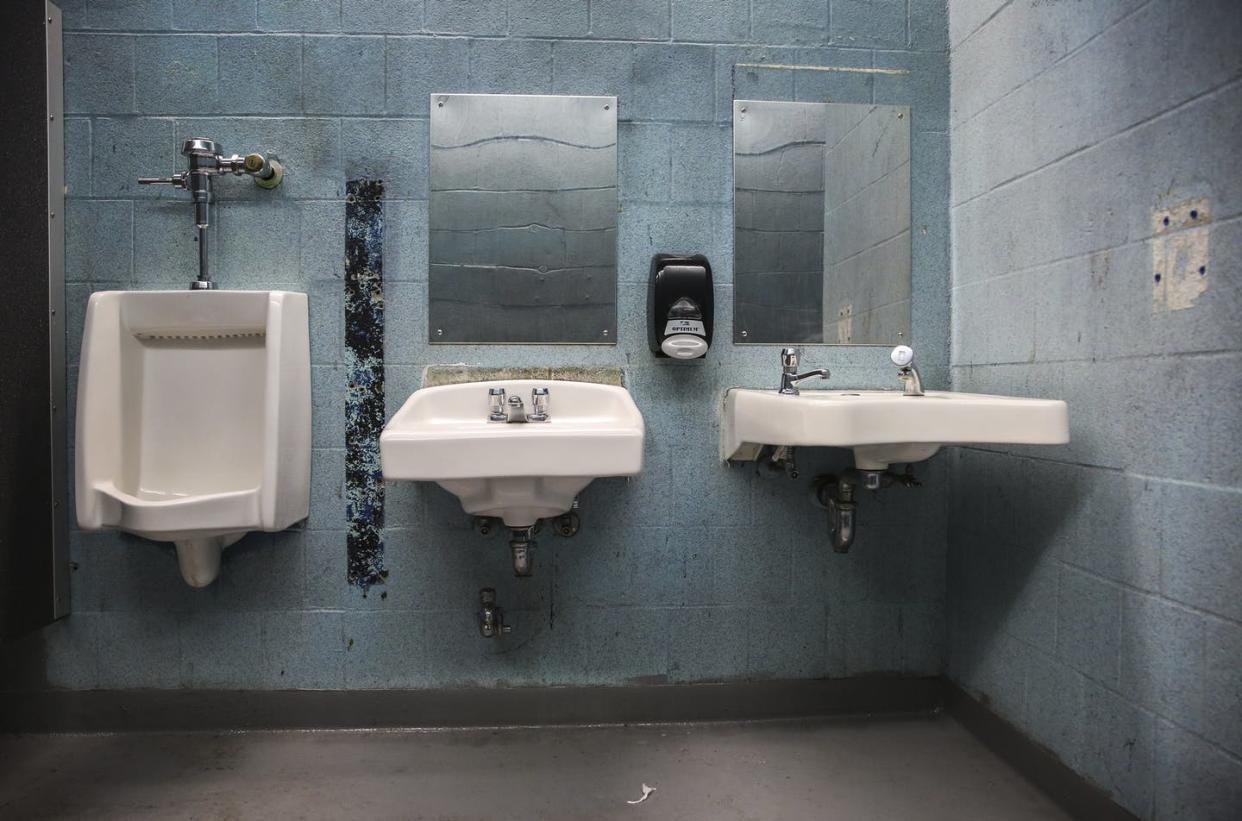 <span class="caption">Money from the $1.9 trillion American Rescue Plan could go toward much-needed improvements to crumbling public school buildings.</span> <span class="attribution"><a class="link " href="https://www.gettyimages.com/detail/news-photo/bathroom-at-english-high-school-in-the-jamaica-plain-news-photo/1187428222?adppopup=true" rel="nofollow noopener" target="_blank" data-ylk="slk:Erin Clark for The Boston Globe via Getty Images;elm:context_link;itc:0;sec:content-canvas">Erin Clark for The Boston Globe via Getty Images</a></span>