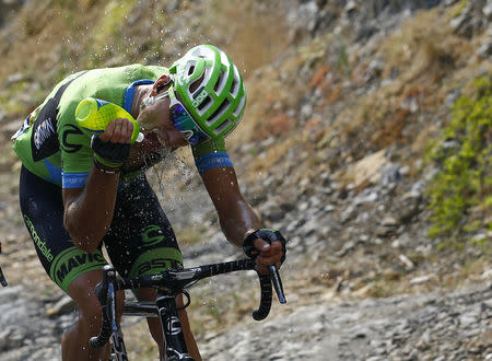 FILE PHOTO: Cannondale-Garmin rider Kristijan Koren of Slovenia drinks as he climbs during the 178.5-km (110.9 miles) 14th stage of the 102nd Tour de France cycling race from Rodez to Mende, France, July 18, 2015. REUTERS/Stefano Rellandini