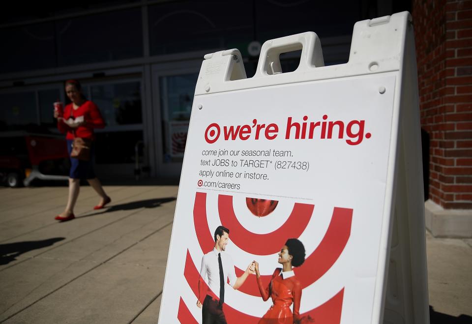 A now hiring sign is posted in front of a Target store on September 25, 2017 in San Rafael, California. Target Corp. announced plans to raise the hourly hourly minimum wage for its workers to $11 per hour beginning in one month and increasing to $15 per hour by the end of 2020. (Photo by Justin Sullivan/Getty Images)