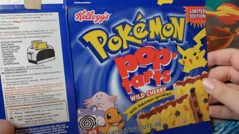 Hands holding box of Pokémon Pop-Tarts