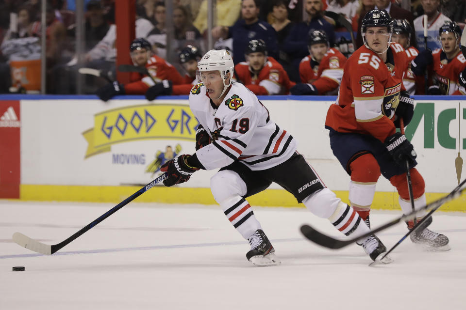 Chicago Blackhawks center Jonathan Toews (19) reacts after he missed the puck during the first period of an NHL hockey game against the Florida Panthers, Saturday, Feb. 29, 2020, in Sunrise, Fla. (AP Photo/Brynn Anderson)