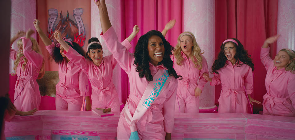 <p>Another shot from the movie shows Issa Rae as "President Barbie" as she dons a pink jumpsuit along with other Barbies. </p>