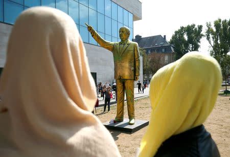 A statue of Turkish President Tayyip Erdogan is seen during the art exhibition "Wiesbaden Biennale" in Wiesbaden, Germany, August 28, 2018. REUTERS/Ralph Orlowski