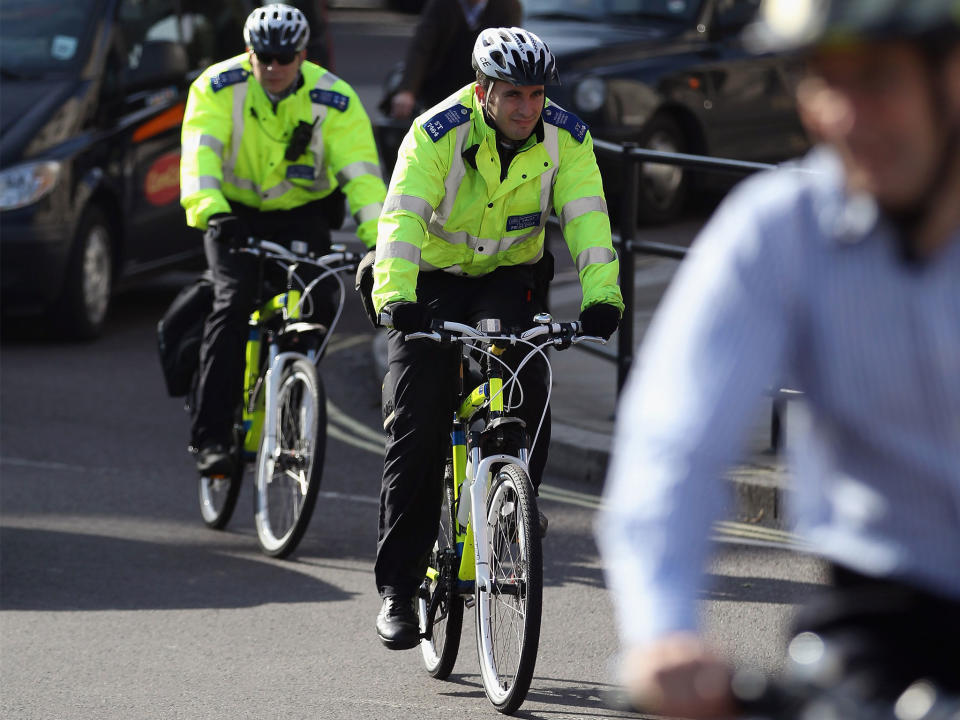 Community Support Officers cycle through central London: Getty