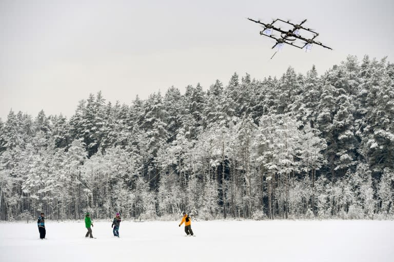 Droneboarders stand on snowboards and grip tow ropes, like those used in water-skiing, and are pulled along by a drone at speeds of up to 60 kph