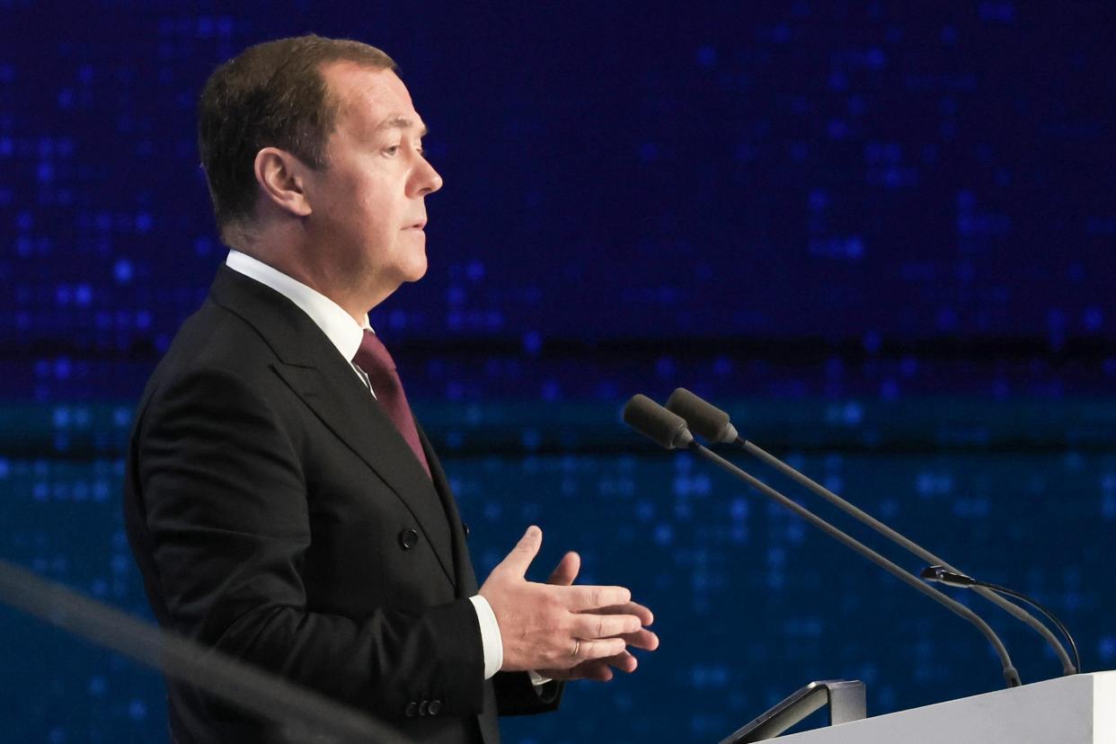 Former Russian president Medvedev called on members to “mobilise all activists and supporters” to ensure Putin win (AP)