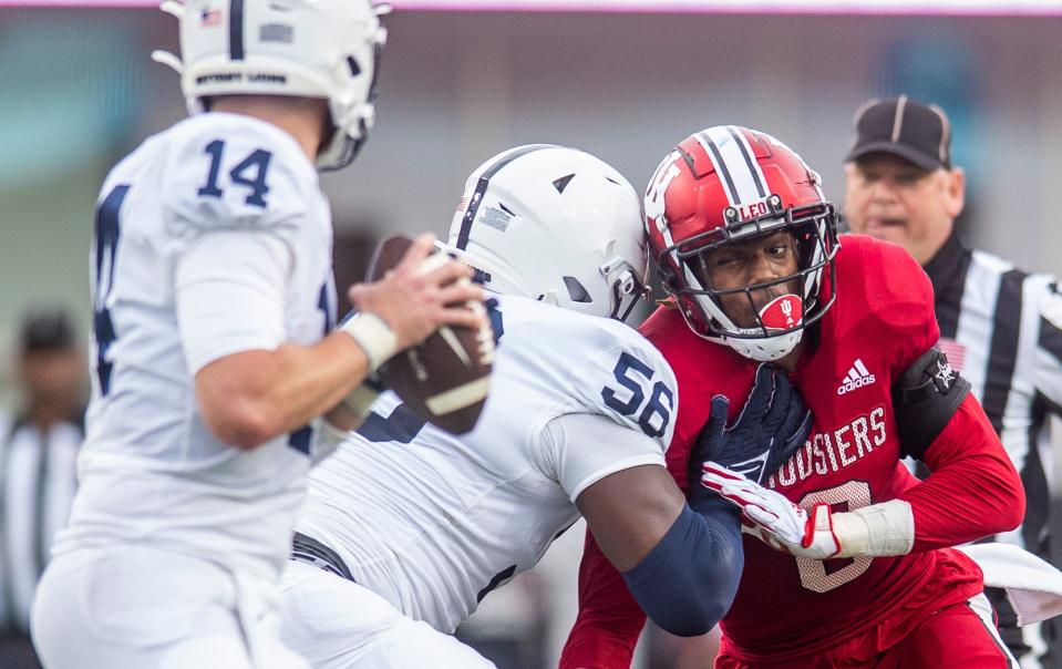 Indiana's Dasan McCullough (0) pressures Penn State's Sean Clifford (14) during the first half of the Indiana versus Penn State football game at Memorial Stadium on Satruday, Nov. 5, 2022.