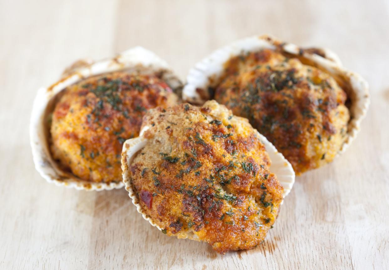 Baked stuffed clams with herbs and spices.
