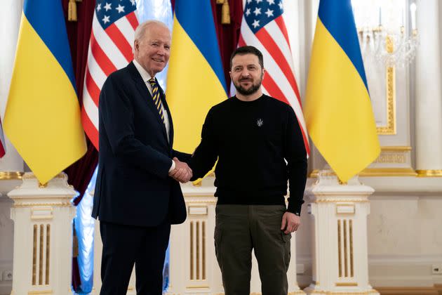 President Joe Biden (left) shakes hands with Ukrainian President Volodymyr Zelenskyy at Mariinsky Palace during an unannounced visit in Kyiv, Ukraine, on Feb. 20.