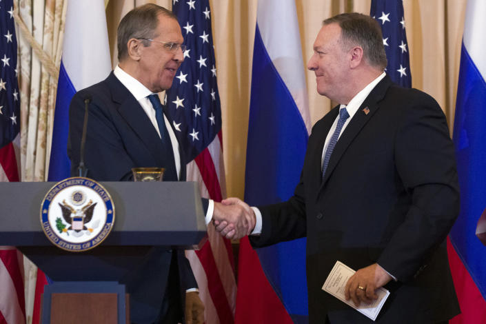 Secretary of State Mike Pompeo, right, shakes hands with Russian Foreign Minister Sergey Lavrov, after a media availability at the State Department, Tues. Dec. 10, 2019 in Washington. (Photo: Alex Brandon/AP)