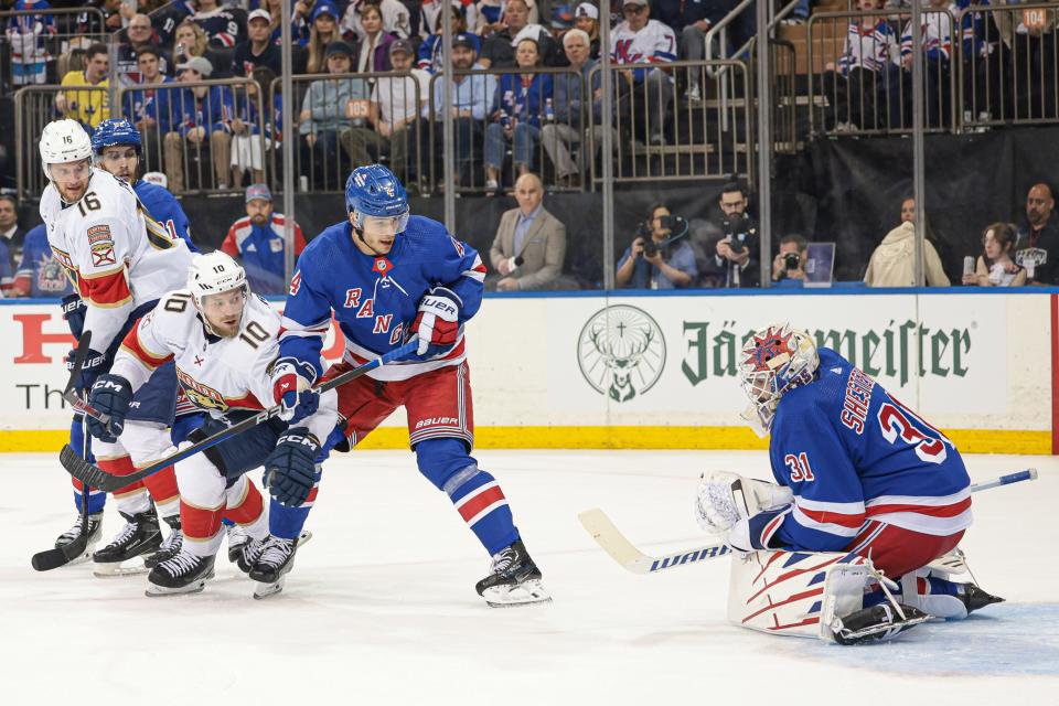 May 24, 2024; New York, New York, USA; New York Rangers goaltender Igor Shesterkin (31) makes a save in front of defenseman Braden Schneider (4) and Florida Panthers right wing Vladimir Tarasenko (10) in game two of the Eastern Conference Final of the 2024 Stanley Cup Playoffs at Madison Square Garden.