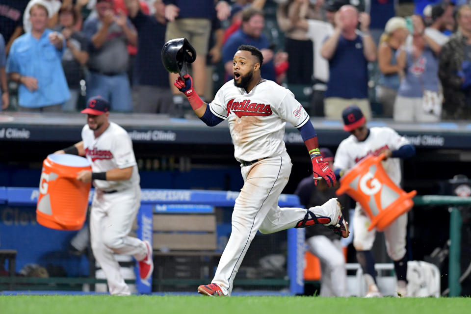 CLEVELAND, OHIO - AUGUST 12: Carlos Santana #41 of the Cleveland Indians rounds the bases on his walk-off solo home run to defeat the Boston Red Sox 6-5 at Progressive Field on August 12, 2019 in Cleveland, Ohio.  (Photo by Jason Miller/Getty Images)