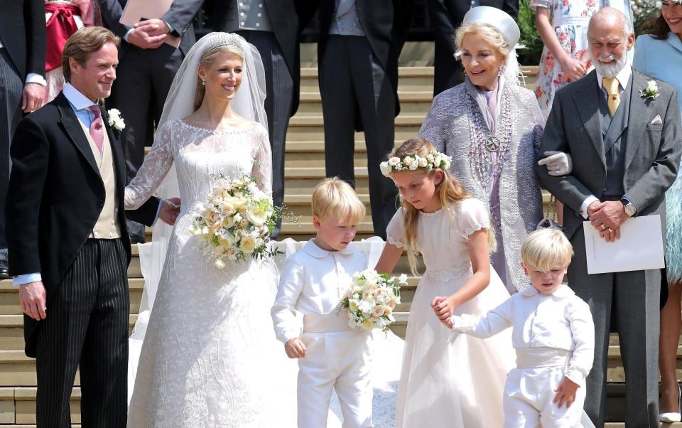 Newlyweds Thomas Kingston (L) and Lady Gabriella Windsor (2L) pose on the steps of St George's Chapel - Chris Jackson/AFP via Getty Images