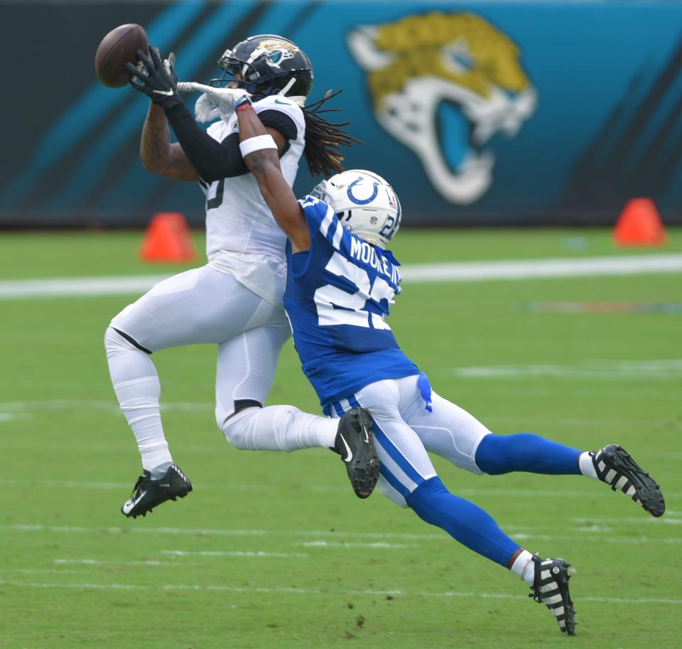 Indianapolis Colts cornerback Kenny Moore II (23) breaks up a pass intended for Jacksonville Jaguars wide receiver Laviska Shenault Jr. (10) during first quarter action. The half ended with the Colts with a 17 to 14 lead over the Jaguars. The Jacksonville Jaguars hosted the Indianapolis Colts for the season opening game at TIAA Bank Field Sunday, September 13, 2020. [Bob Self/Florida Times-Union]