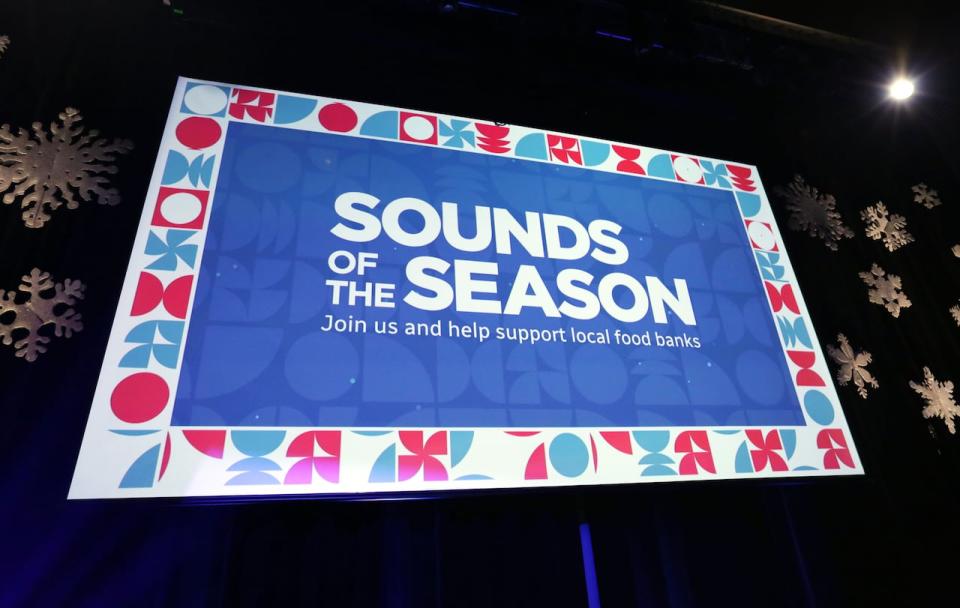 Sounds of the Season 2023 signage on the stage screen in CBC's Glenn Gould Studio.