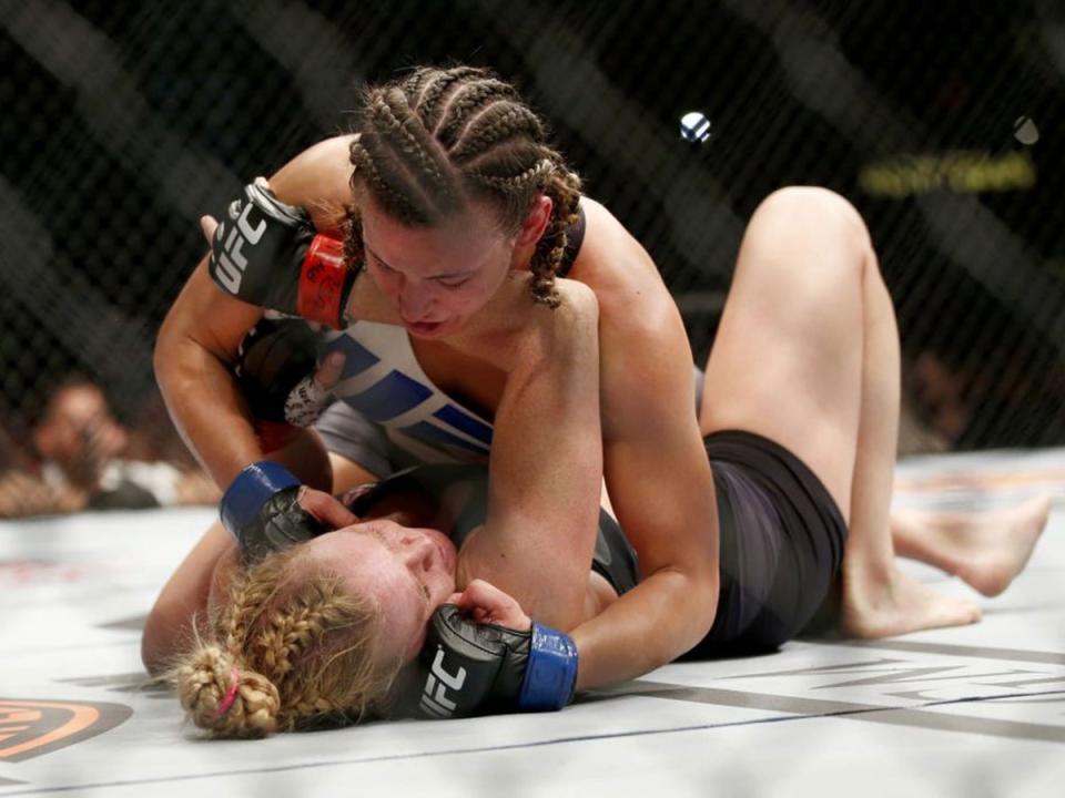 Miesha Tate dominated Holly Holm during their bantamweight title fight in 2016 (AP)