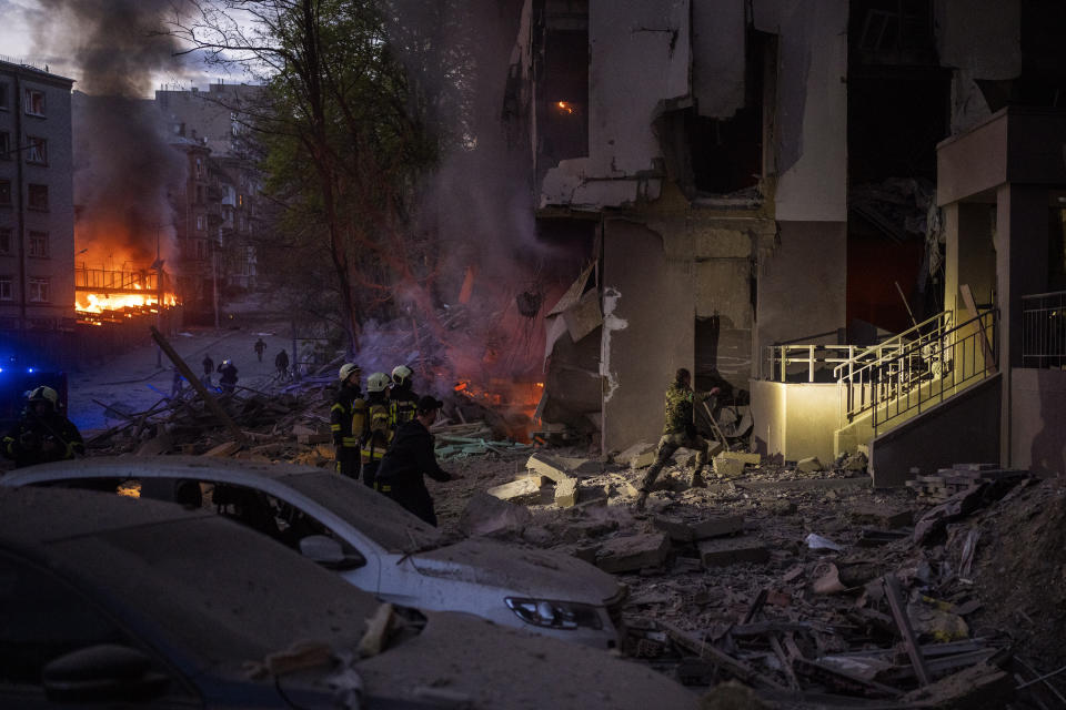 Emergency services respond in the area following an explosion in Kyiv, Ukraine on Thursday, April 28, 2022. Russia struck the Ukrainian capital of Kyiv shortly after a meeting between President Volodymyr Zelenskyy and U.N. Secretary-General António Guterres on Thursday evening. (AP Photo/Emilio Morenatti)