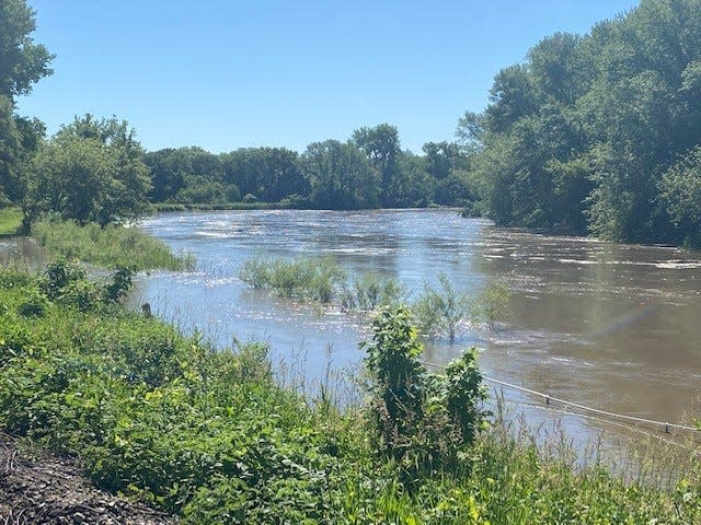 The Bill Riley Trail at Des Moines' Water Works Park was flooded by the Raccoon River Tues. June 7, 2022.