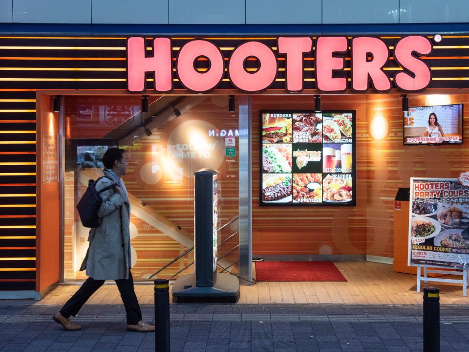 Outside of a Hooters restaurant.