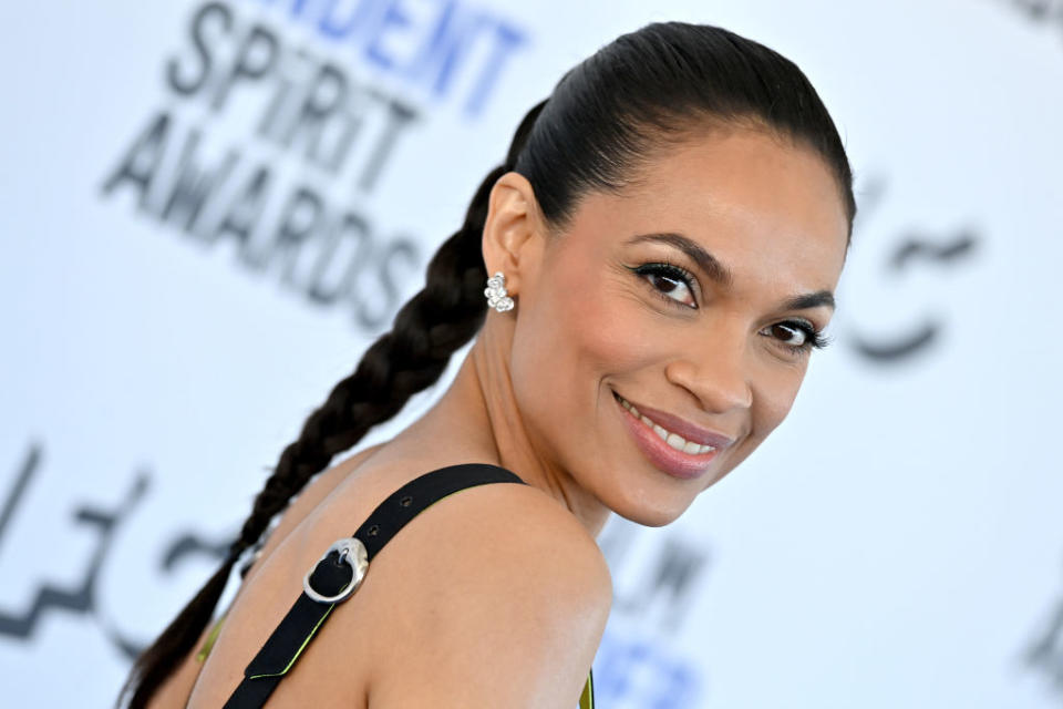 Close-up of Rosario smiling at a media event