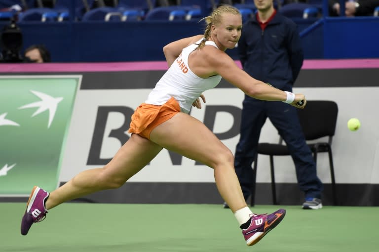 Netherland's Kiki Bertens eyes the ball for a return to Russia's Svetlana Kuznetsova during the Fed Cup in Moscow on February 7, 2016