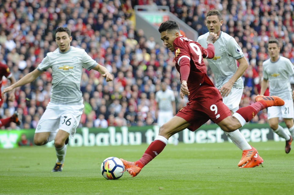 <p>Liverpool’s Roberto Firmino aims for goal</p>