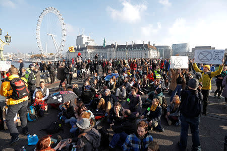 Environmental campaigners from the direct action group Rebellion demonstrate on Westminster Bridge in central London, Britain, November 17, 2018. REUTERS/Peter Nicholls