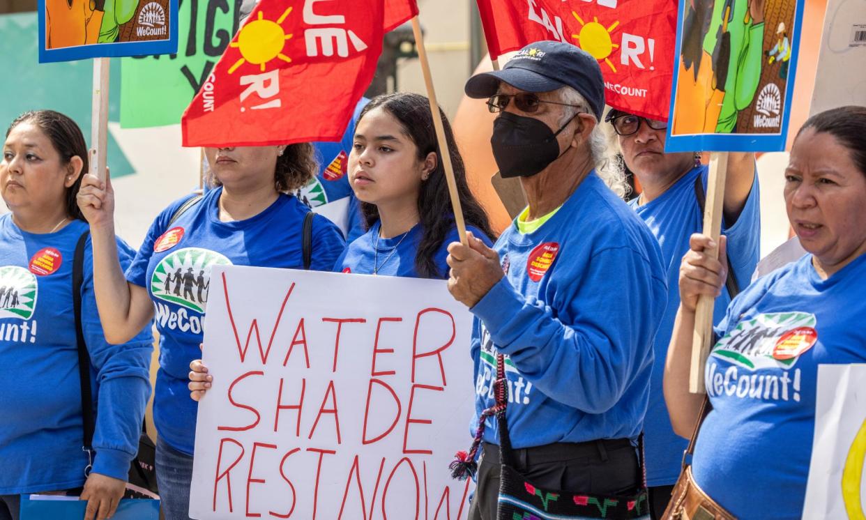 <span>Florida’s outdoor workers demand better working conditions and protection against the extreme heat in June 2023.</span><span>Photograph: Cristóbal Herrera/EPA</span>