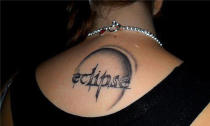 <p>This tattoo is of the title of the 'Eclipse' - the third installment of the Twilight series - complete with the same font as the book.<br><br><a rel="nofollow" href="http://au.launch.yahoo.com/galleries/g/-/11220329/nude-photo-scandals-in-music/11220339/" data-ylk="slk:PICS: Nude Scandals in Music;elm:context_link;itc:0;sec:content-canvas" class="link ">PICS: Nude Scandals in Music</a></p>