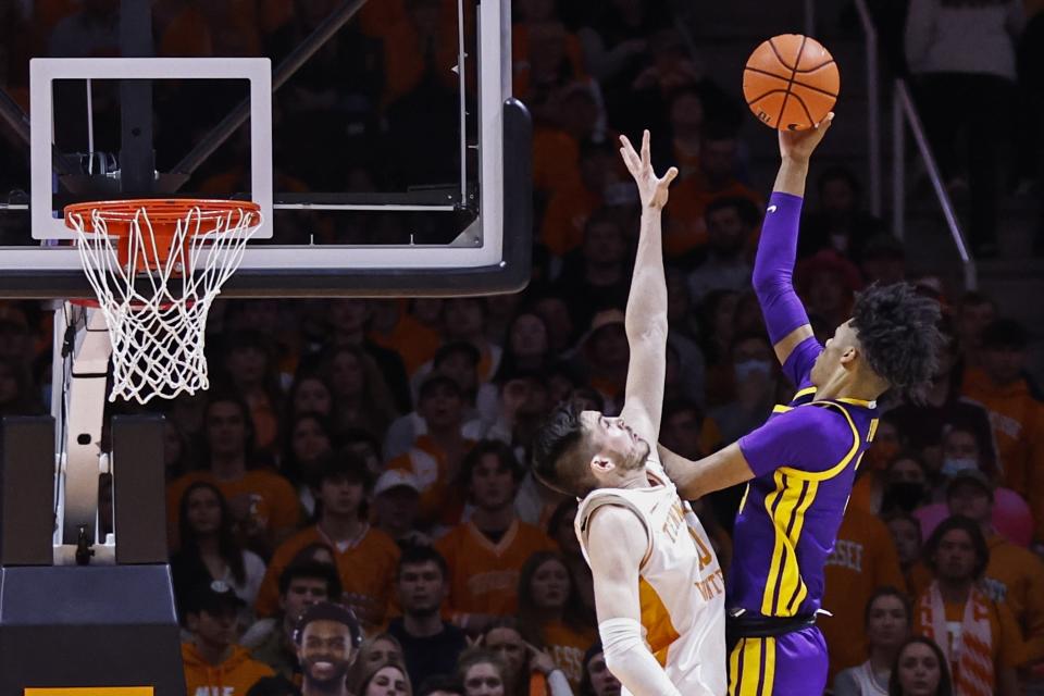 LSU guard Brandon Murray (0) shoots over Tennessee forward John Fulkerson (10) during the first half of an NCAA college basketball game Saturday, Jan. 22, 2022, in Knoxville, Tenn. (AP Photo/Wade Payne)