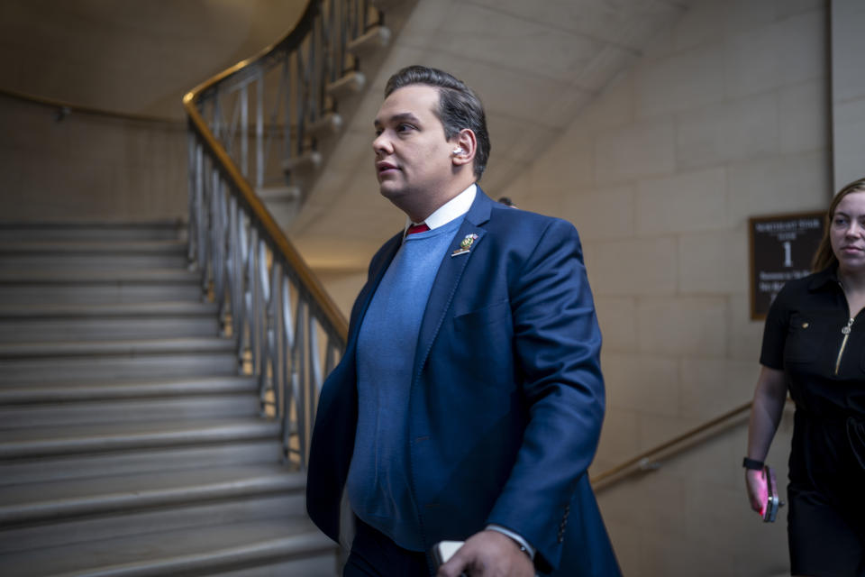 Rep. George Santos, R-N.Y., arrives as House Republicans hold a closed-door meeting to vote by secret ballot on their candidate for speaker of the House, at the Capitol in Washington, Wednesday, Oct. 11, 2023. (AP Photo/J. Scott Applewhite)