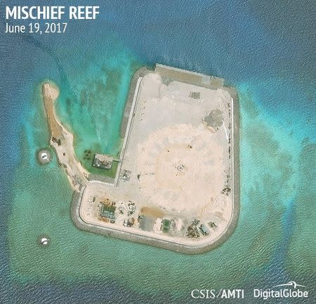 Construction is shown on Mischief Reef, in the Spratly Islands, the disputed South China Sea in this June 19, 2017 satellite image released by CSIS Asia Maritime Transparency Initiative at the Center for Strategic and International Studies (CSIS) to Reuters on June 29, 2017. MANDATORY CREDIT CSIS/AMTI DigitalGlobe/Handout via REUTERS